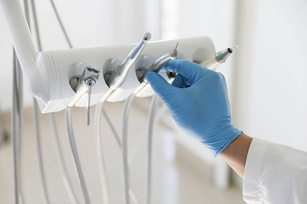 Professional Invisalign Clear Aligners technician working in Saint John Fisher College, NY